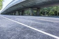 Asphalt roads and city buildings under the overpass, automobile advertising road material.